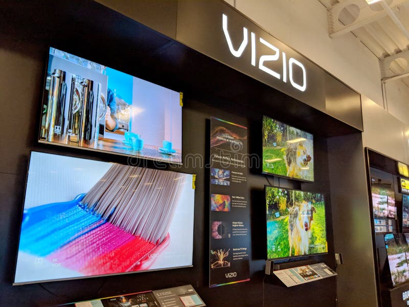 Honolulu - August 10 2018: Vizio TV Display with Paint brush and Dog shaking on screens inside Best Buy. VIZIO is the maker of the top-selling 4K HDR TVs and America& x27;s 1 Sound Bar Brand. VIZIO& x27;s mission is to deliver high performance, smarter products with the latest technology innovations. Honolulu - August 10 2018: Vizio TV Display with Paint brush and Dog shaking on screens inside Best Buy. VIZIO is the maker of the top-selling 4K HDR TVs and America& x27;s 1 Sound Bar Brand. VIZIO& x27;s mission is to deliver high performance, smarter products with the latest technology innovations